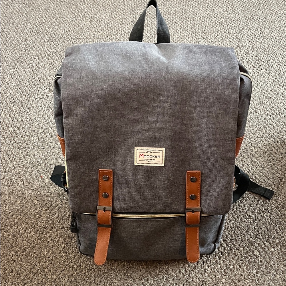 Gray Canvas Backpack with Brown Trim